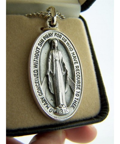 Silver Toned Base Oval Virgin Mother Mary Madonna Medal, 1 1/2 Inch $12.15 Pendants